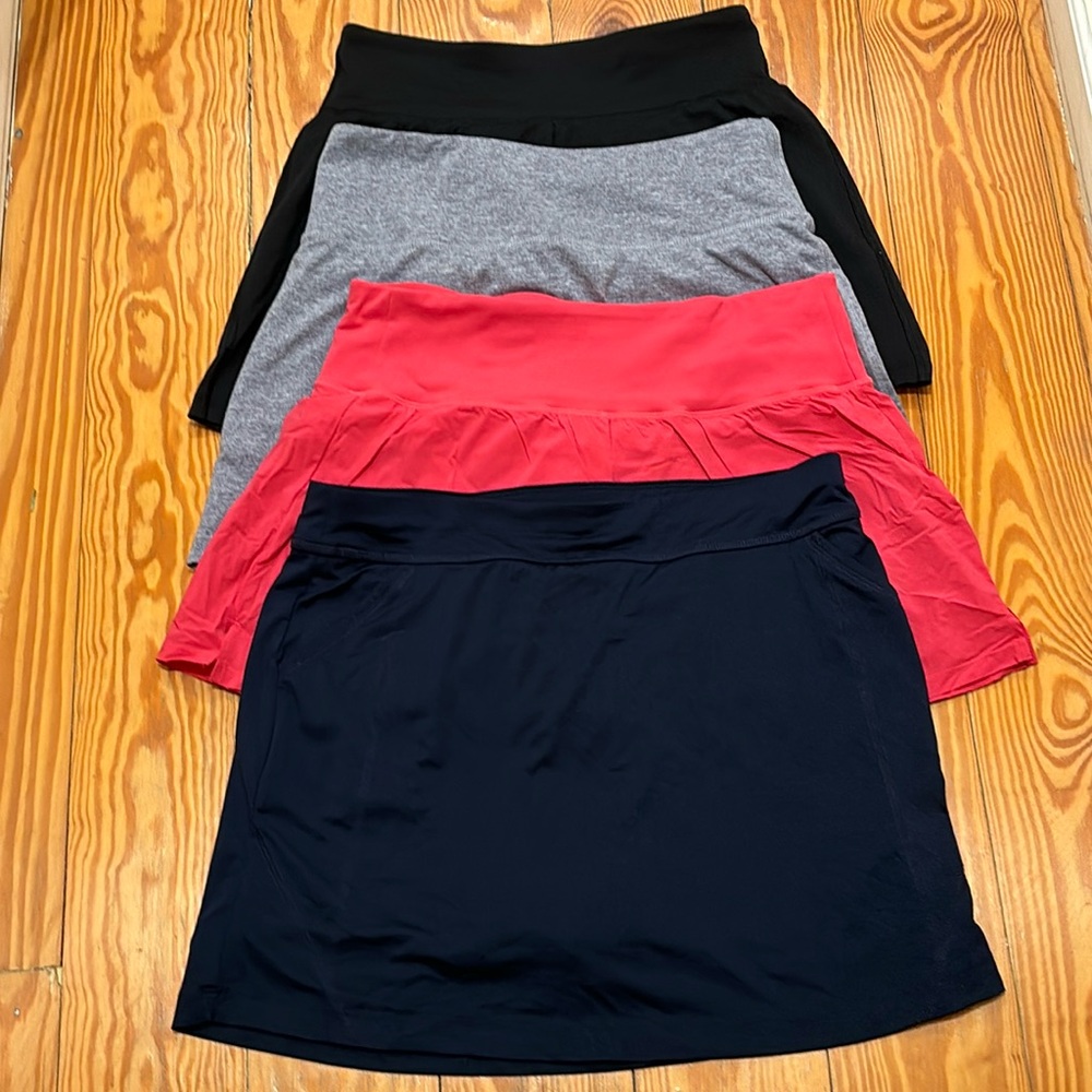Bundle of 4 athletic/golf skirts